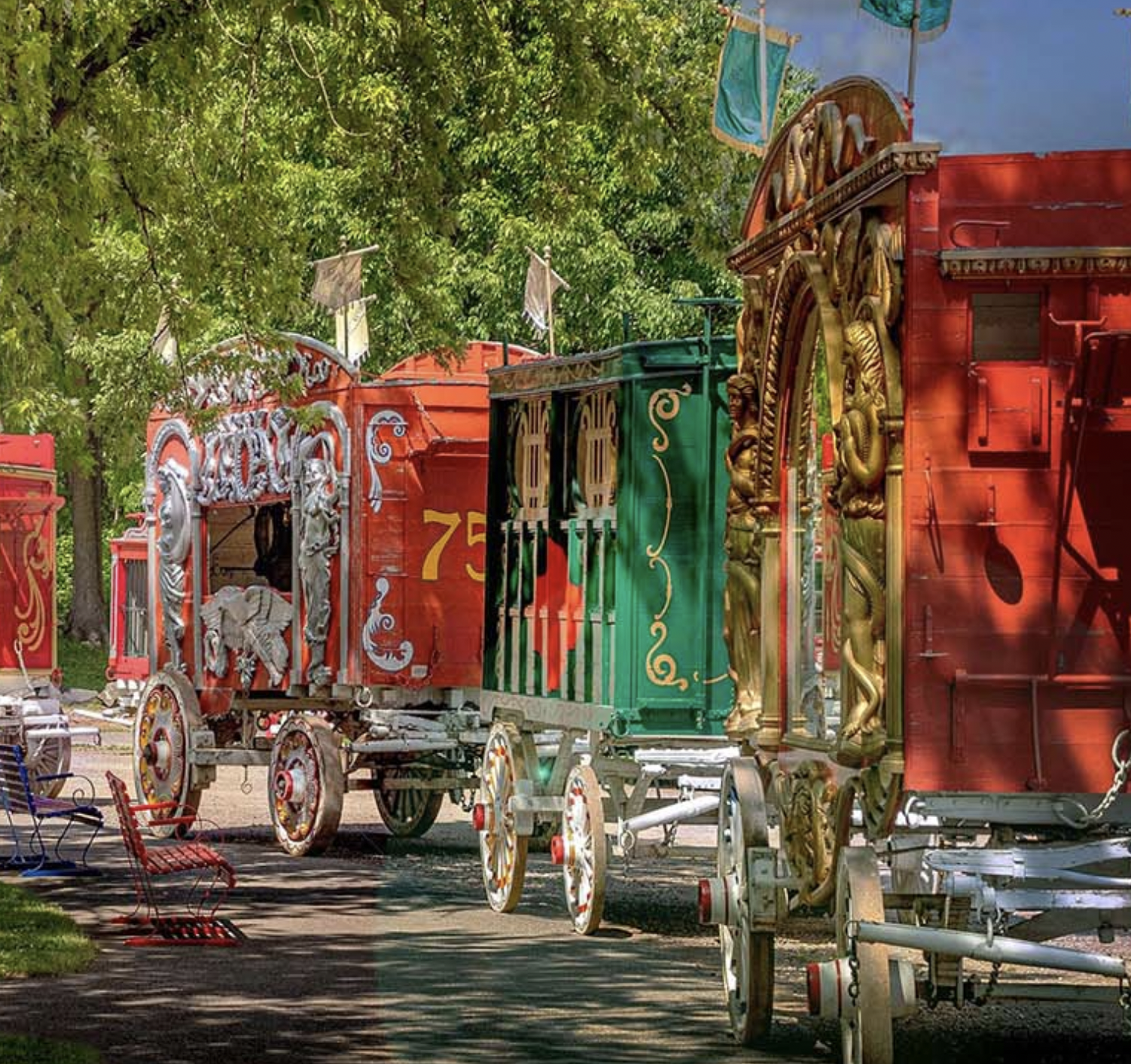 train of colorful circus wagons