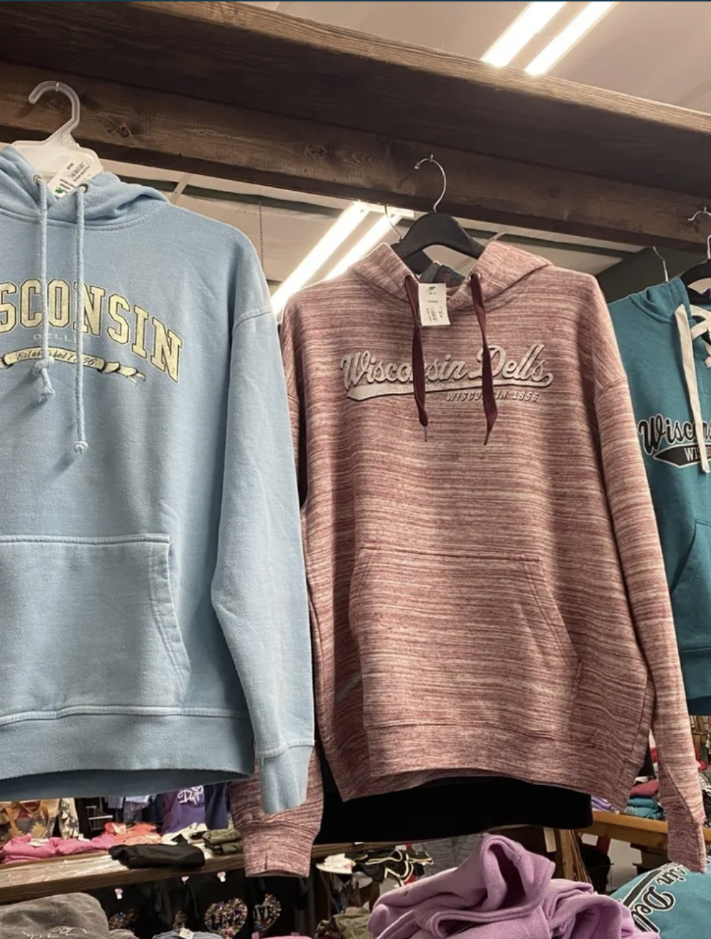 Wisconsin Dells hooded sweatshirts in a shop