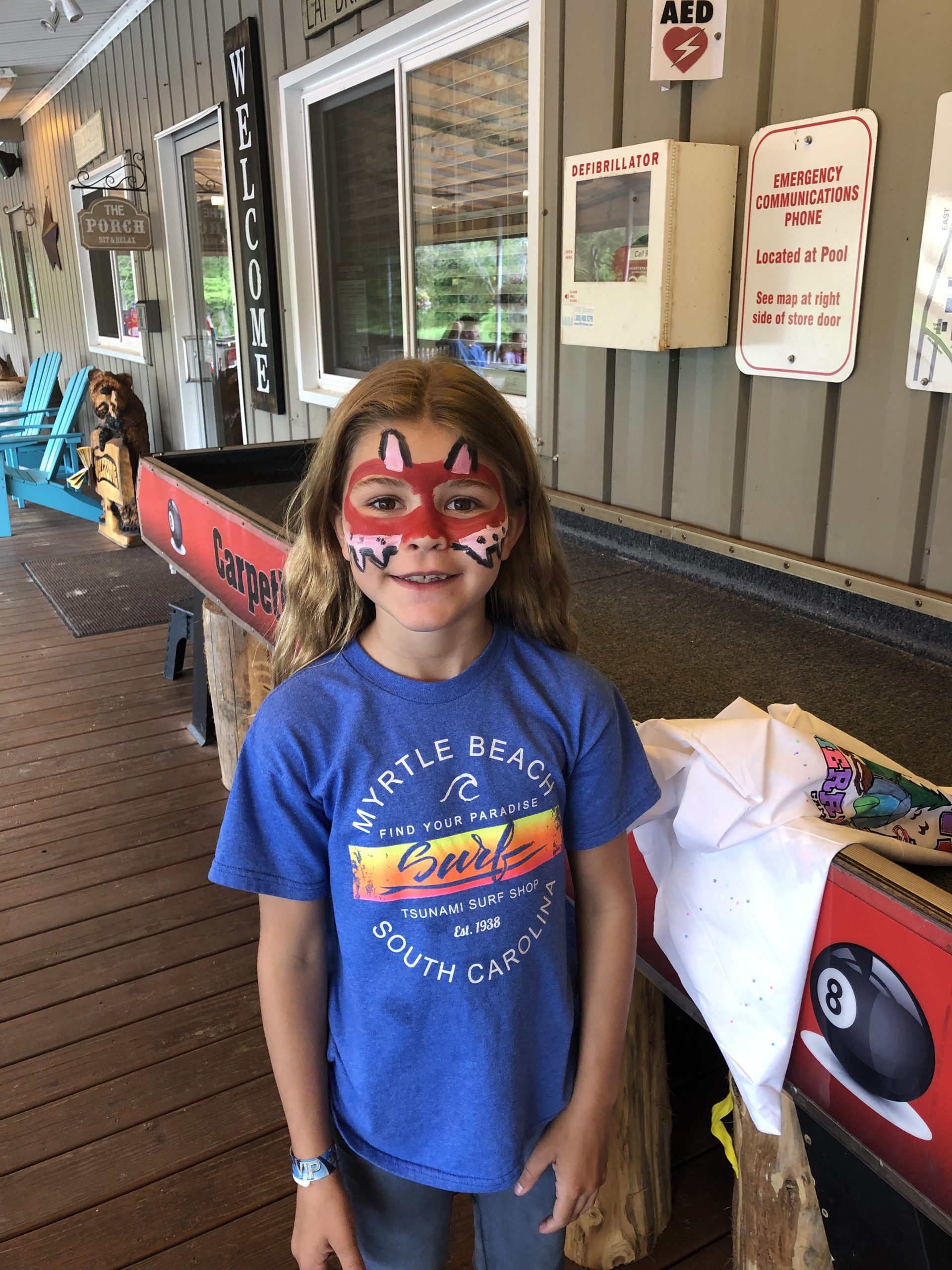 girl in facepaint at Merry Macs campground