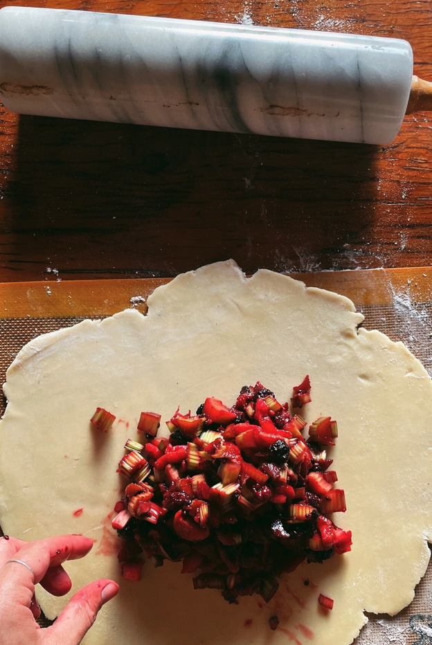 baker making rhubarb pie