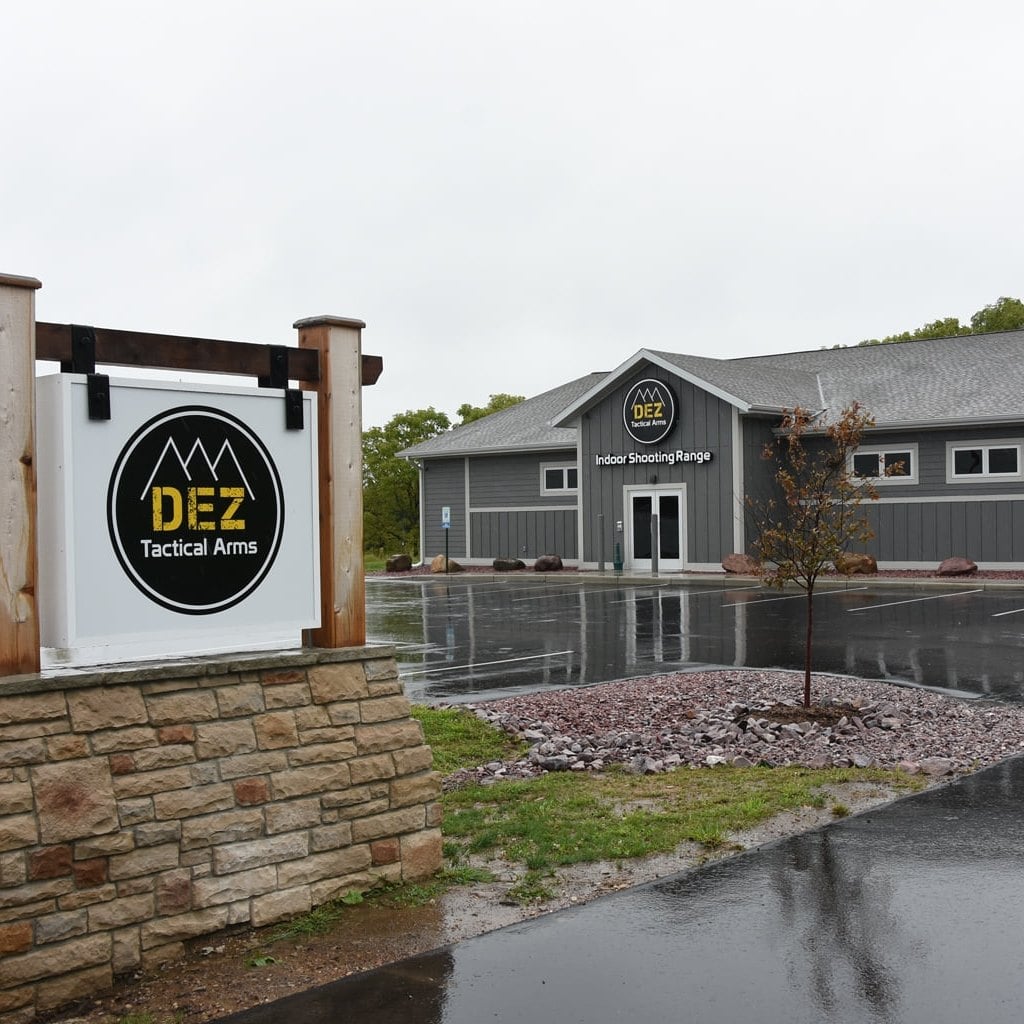 exterior of building and sign for an indoor shooting range
