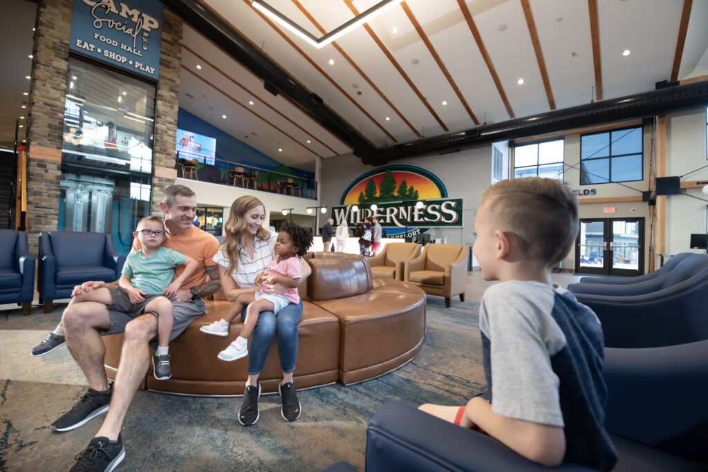 Family in lobby of Wilderness Resort in Sauk County, Wisconsin